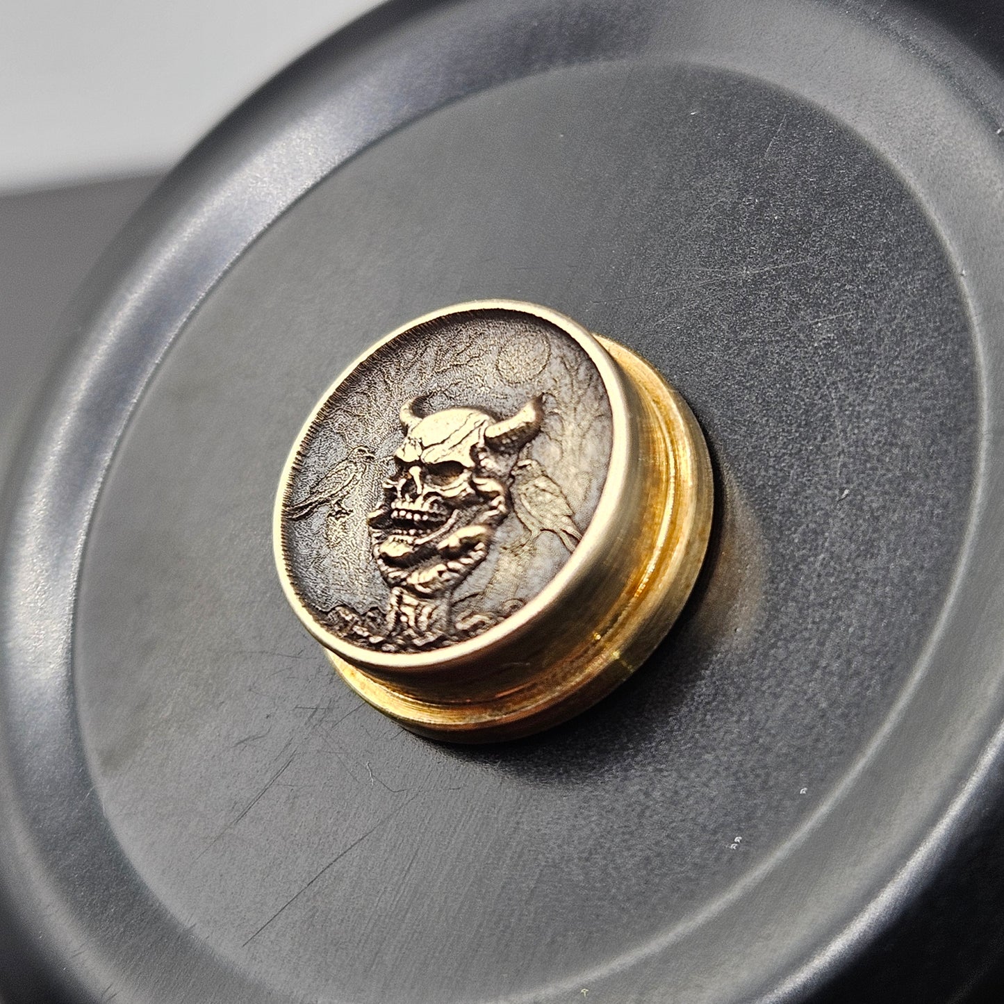 LASER ENGRAVED BMM 3D SKULL IN HAND BUTTON