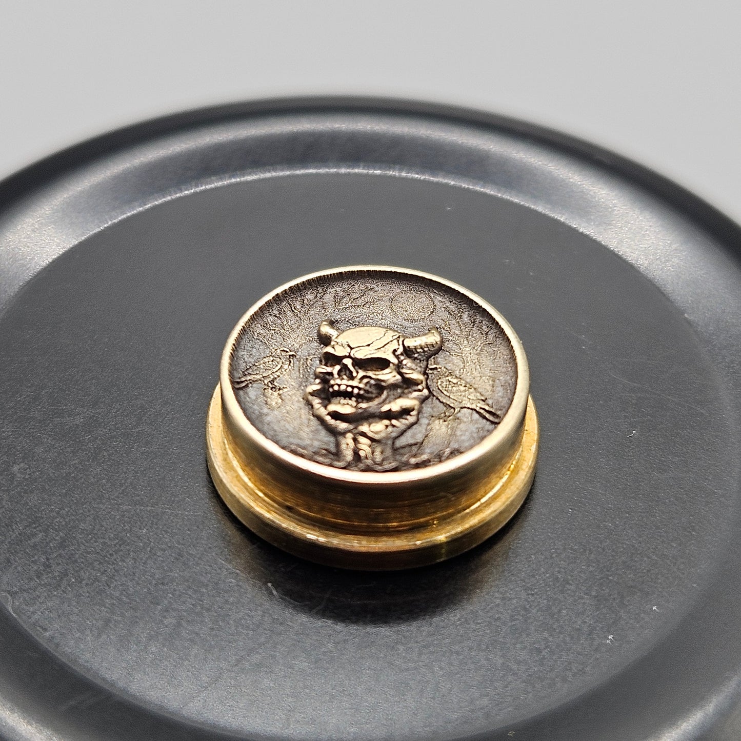 LASER ENGRAVED BMM 3D SKULL IN HAND BUTTON