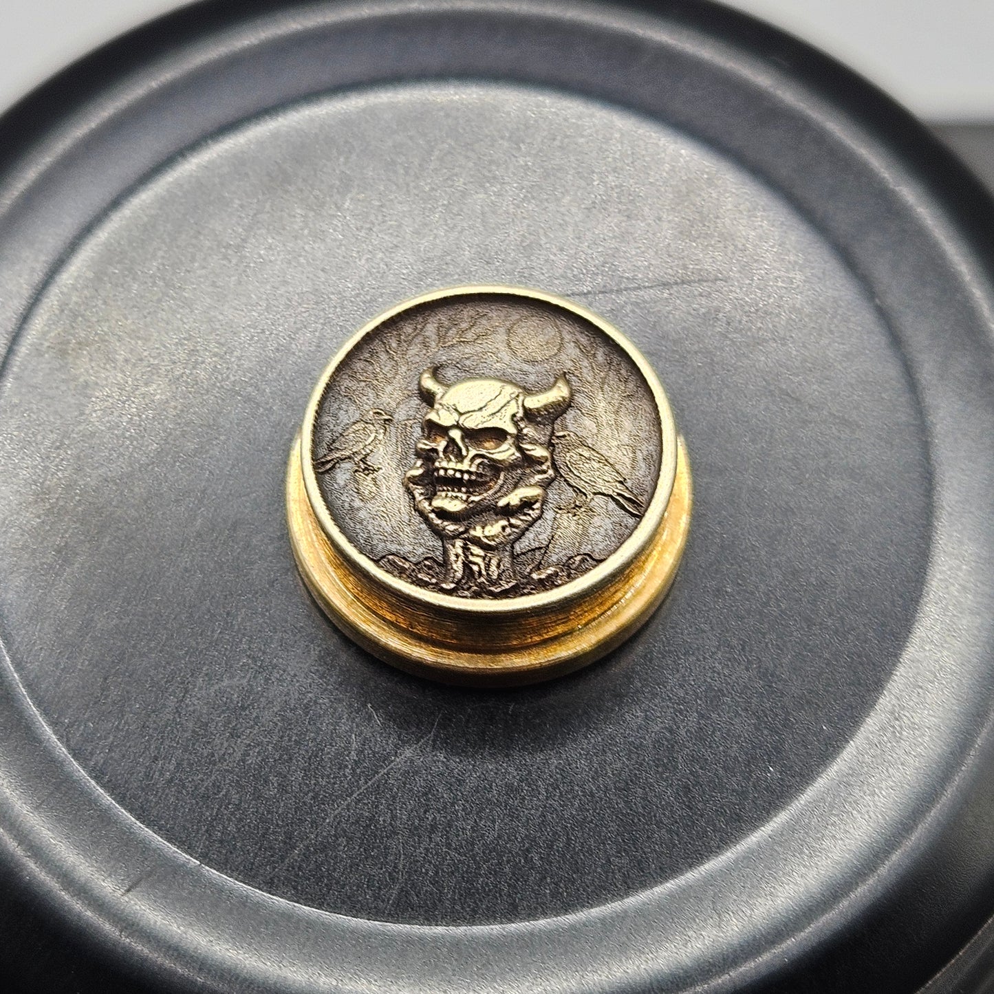 LASER ENGRAVED BMM 3D SKULL IN HAND BUTTON